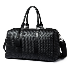 Spot printemps nouveau sac de voyage neutre de style européen et américain affaires portable grand sac couleur unie sac tissé à la main à une épaule