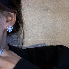 Aretes de corazón de melocotón